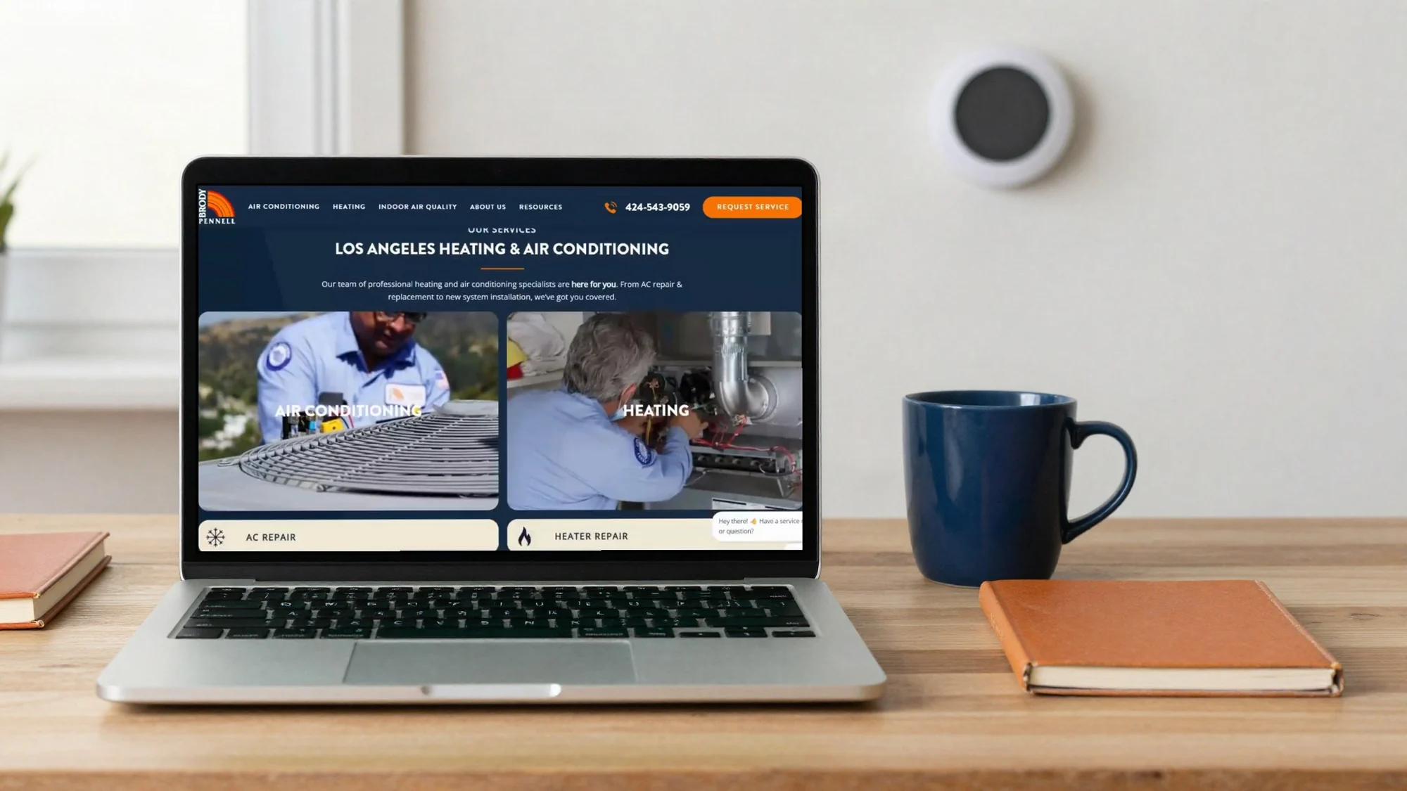 Heating and air conditioning services section on a laptop on a desk